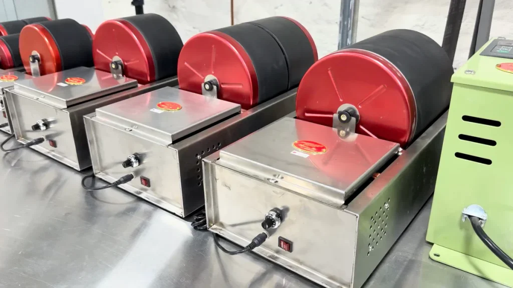 rotary tumblers lined up